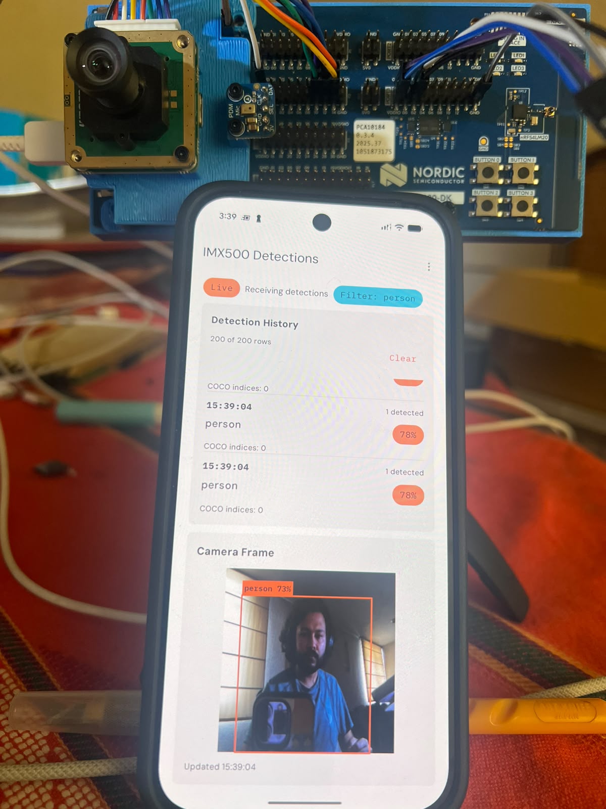 The Android app showing a detection with its class, confidence, and the frame that caused it.